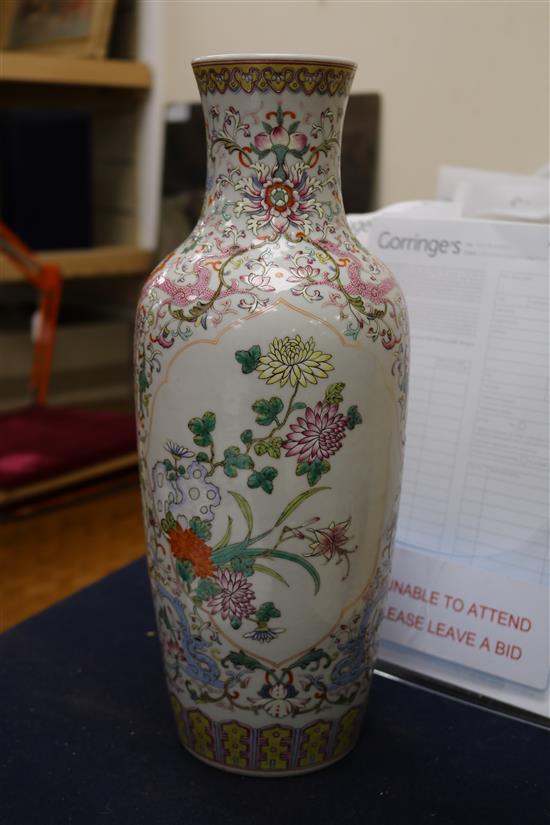 A Chinese famille rose baluster vase, height 37.5cm, wood stand